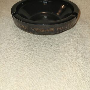 LAS VEGAS HILTON BLACK ASHTRAY WITH BRONZE LETTERING